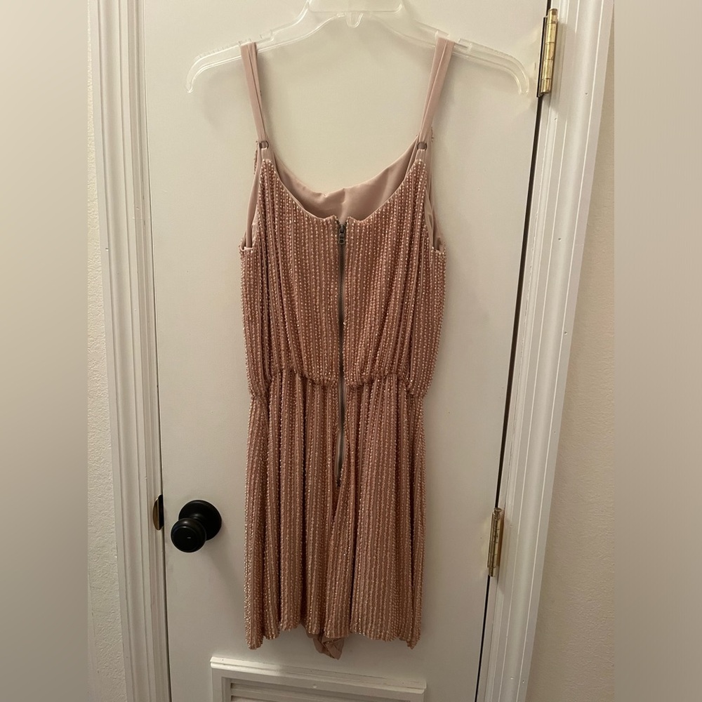 Brand new Allison Olivia off blush color with rhinestones .